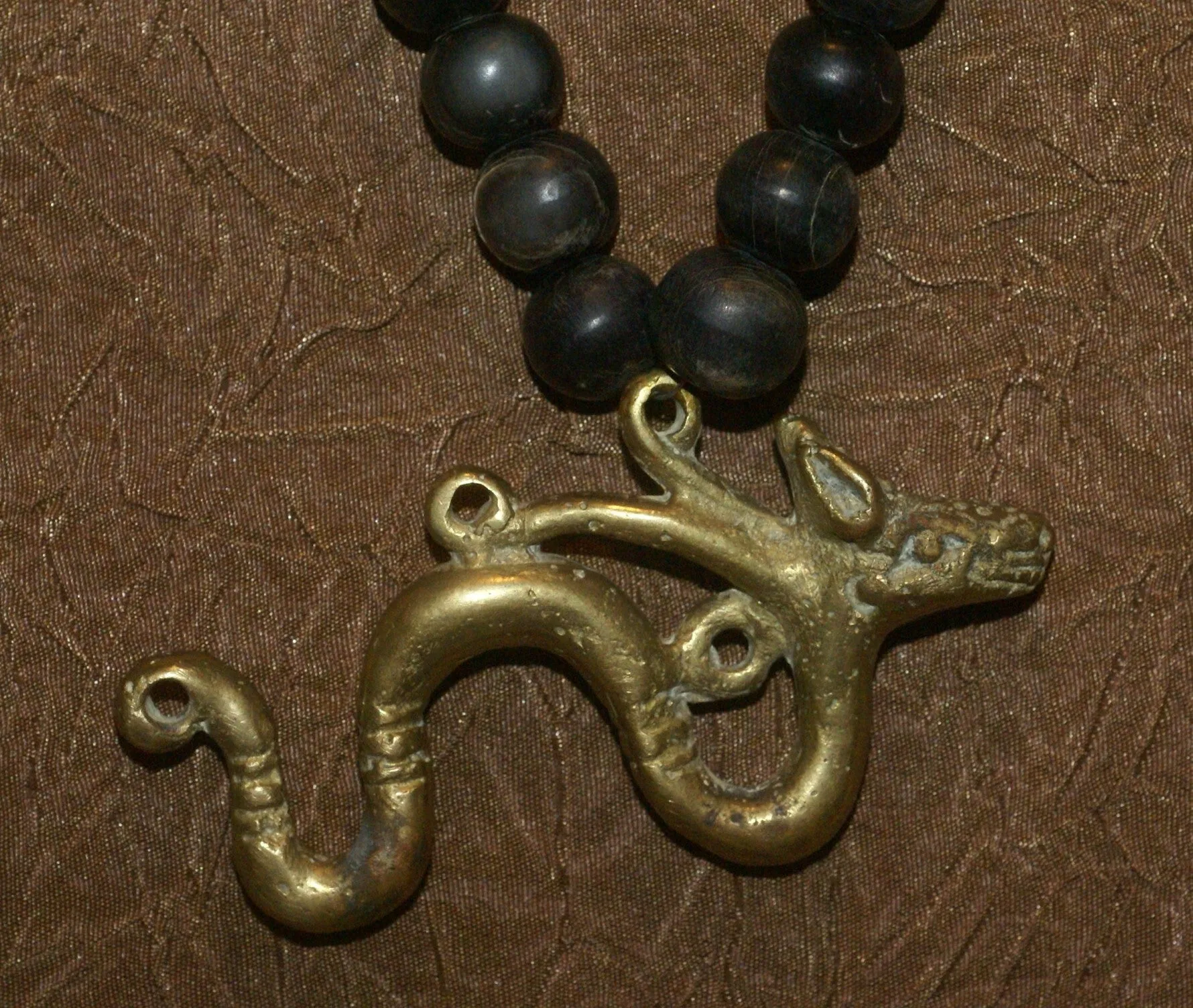 Borneo Tribal Oran Ulu, Dayak, Iban Tribe Heavy Brass Bronze Aso Dog Dragon Earring Talisman, Ear Weight Used as a Pendant for Necklace with Dark Old Glass Trade Beads NB15