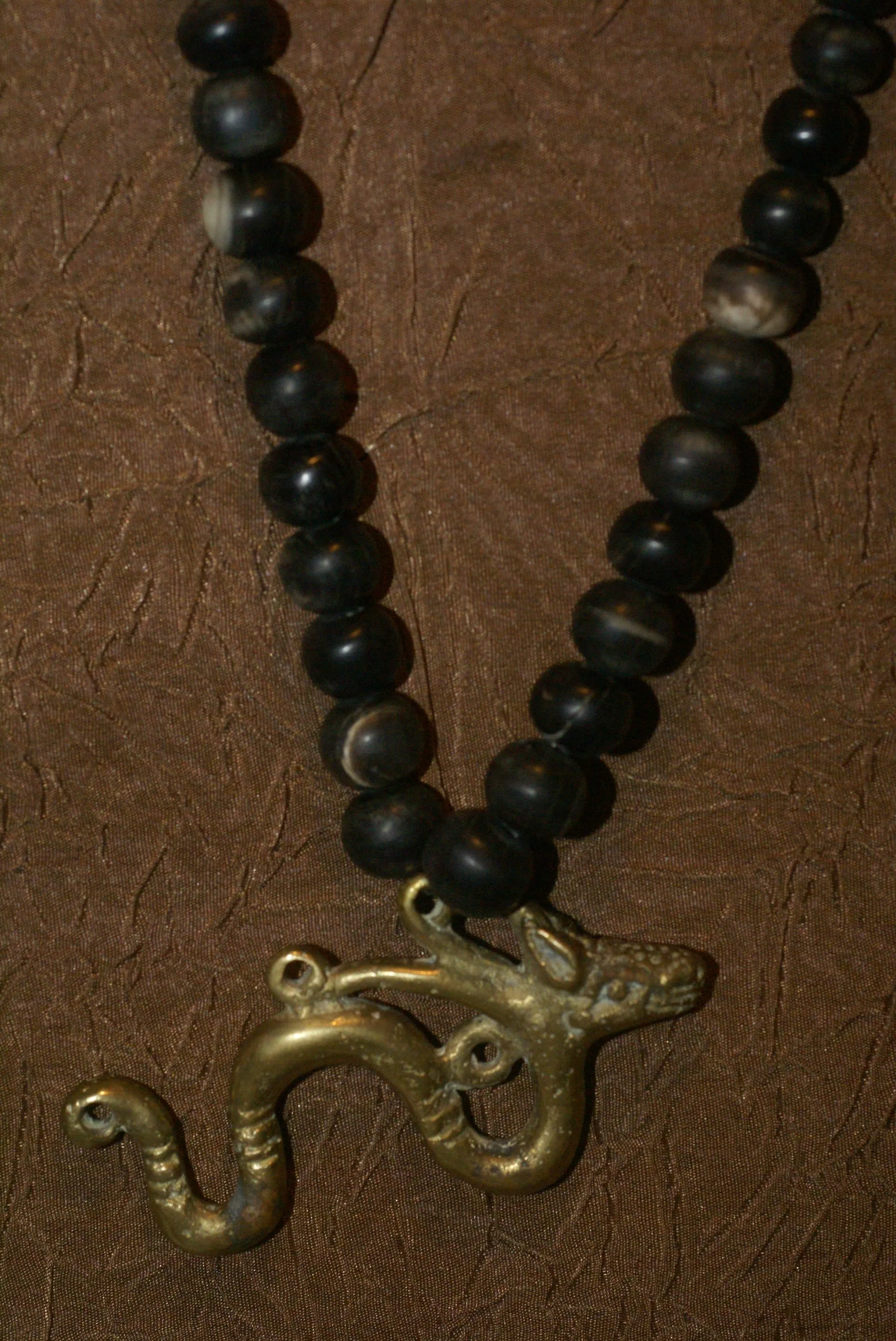 Borneo Tribal Oran Ulu, Dayak, Iban Tribe Heavy Brass Bronze Aso Dog Dragon Earring Talisman, Ear Weight Used as a Pendant for Necklace with Dark Old Glass Trade Beads NB15