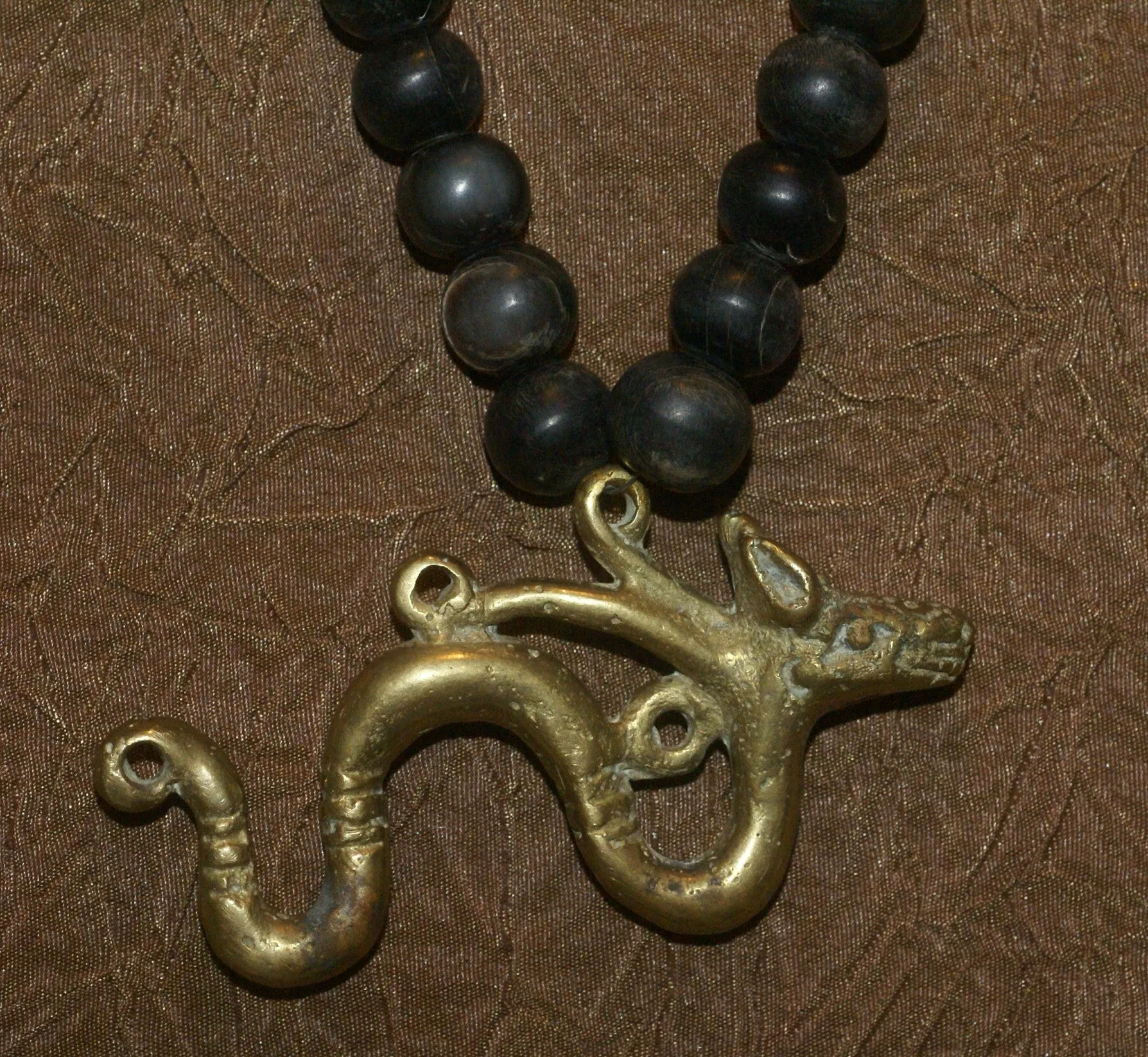 Borneo Tribal Oran Ulu, Dayak, Iban Tribe Heavy Brass Bronze Aso Dog Dragon Earring Talisman, Ear Weight Used as a Pendant for Necklace with Dark Old Glass Trade Beads NB15