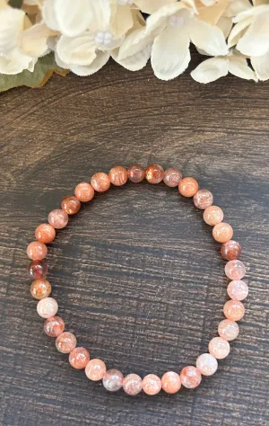 Natural Stone Gem Bracelet 7 inch Stretch 6mm Round-Sunstone
